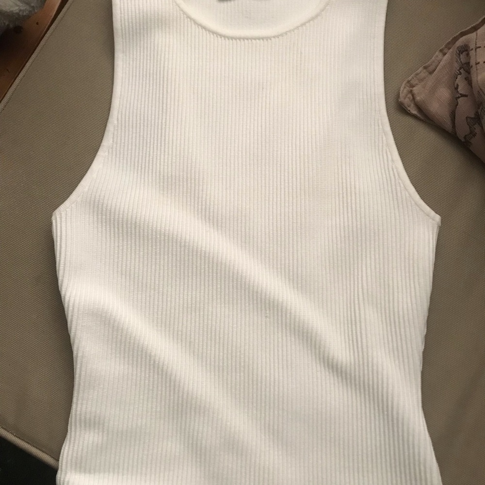 Cute well made top new never worn without tags.